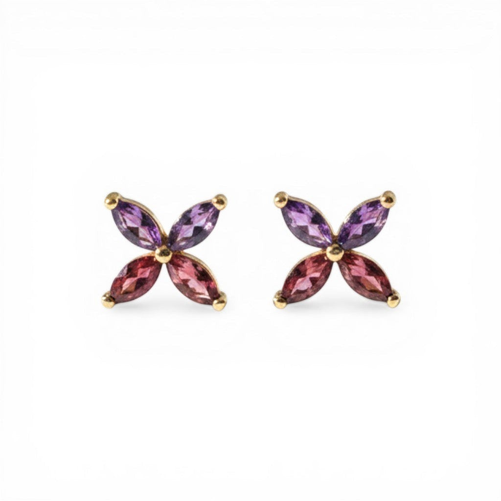 Sophia Schneider Joyas 14K gold earrings with marquise-cut amethyst and rhodolite stones in a floral design.