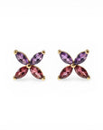Sophia Schneider Joyas 14K gold earrings with marquise-cut amethyst and rhodolite stones in a floral design.