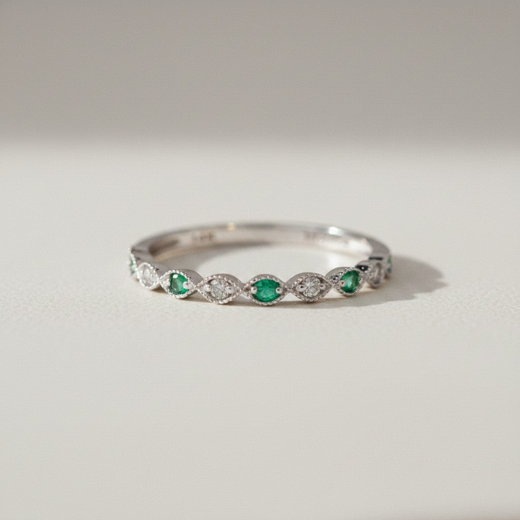 Sophia Schneider Joyas 14K white gold eternity band with alternating emeralds and diamonds.