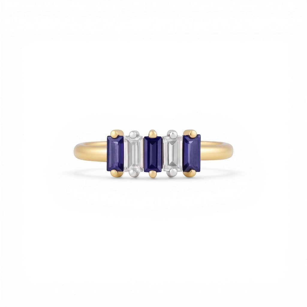 Sophia Schneider Joyas 14K gold ring with alternating Iolita and zircon baguette-cut stones.