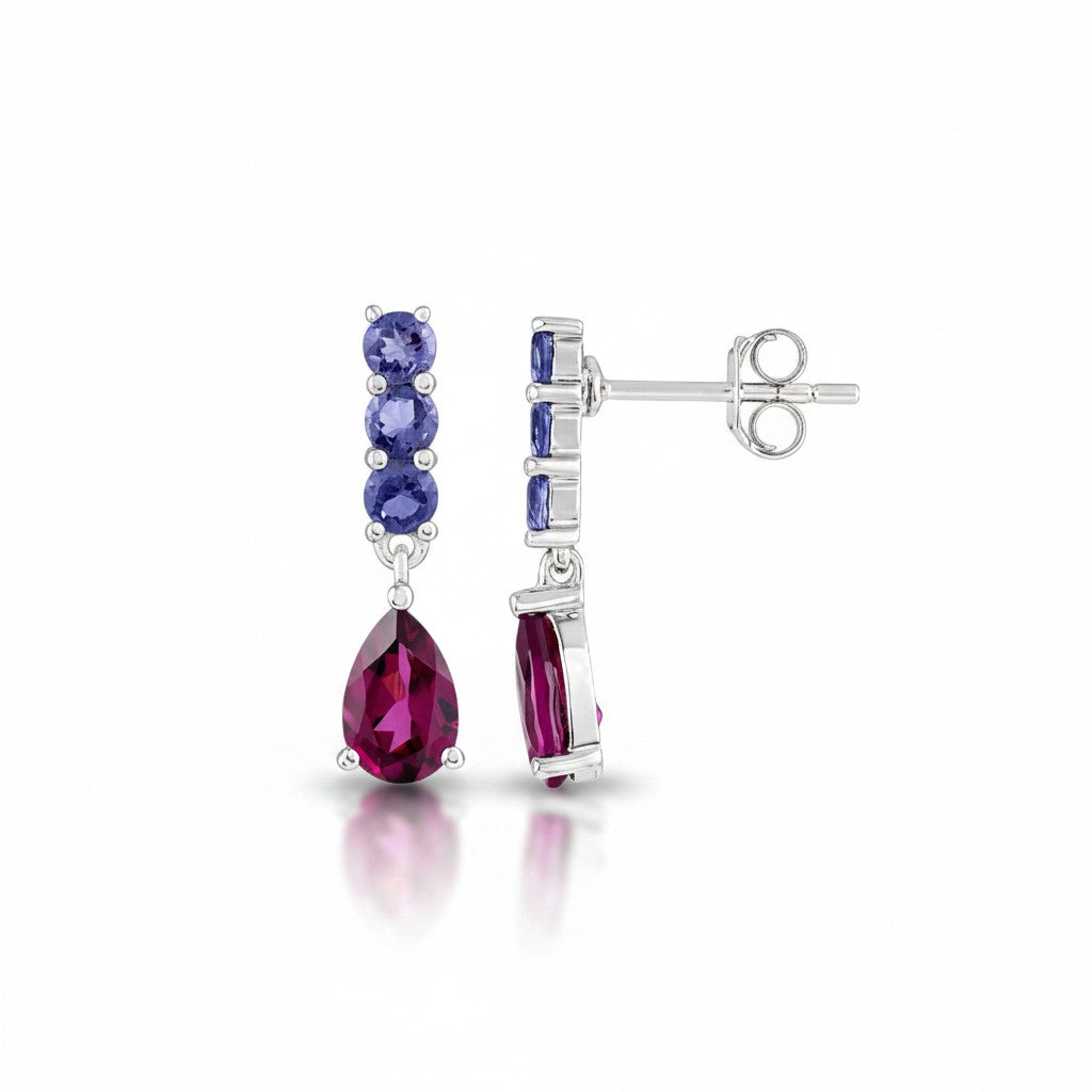 Sophia Schneider Joyas 14K gold drop earrings with blue iolite and pear-cut rhodolite gemstones.