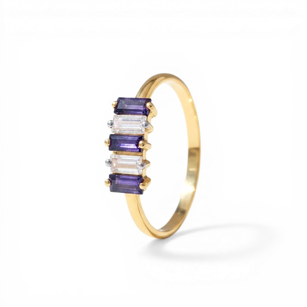 Sophia Schneider Joyas 14K gold ring with alternating purple iolite and clear zircon baguette stones.