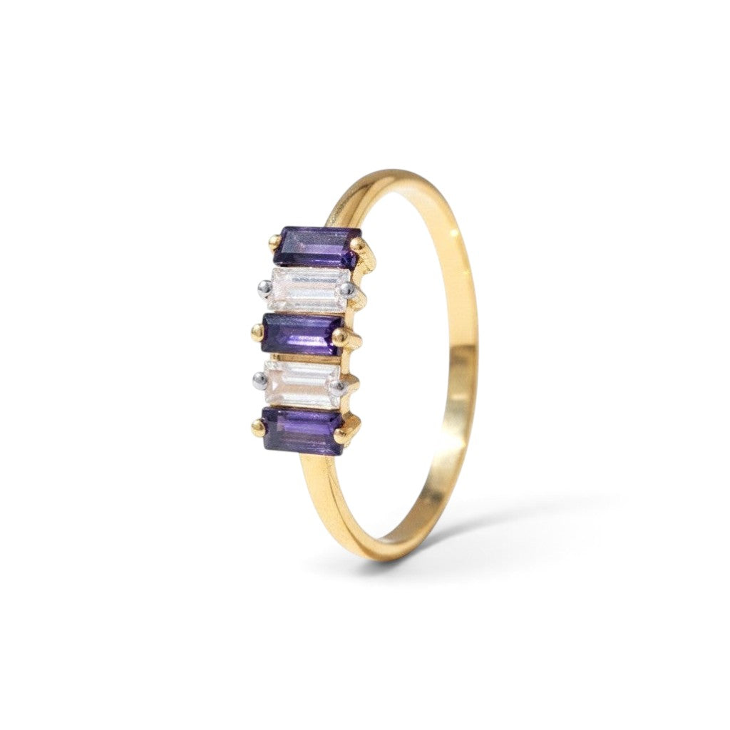 Sophia Schneider Joyas 14K gold ring with alternating purple iolite and clear zircon baguette stones.
