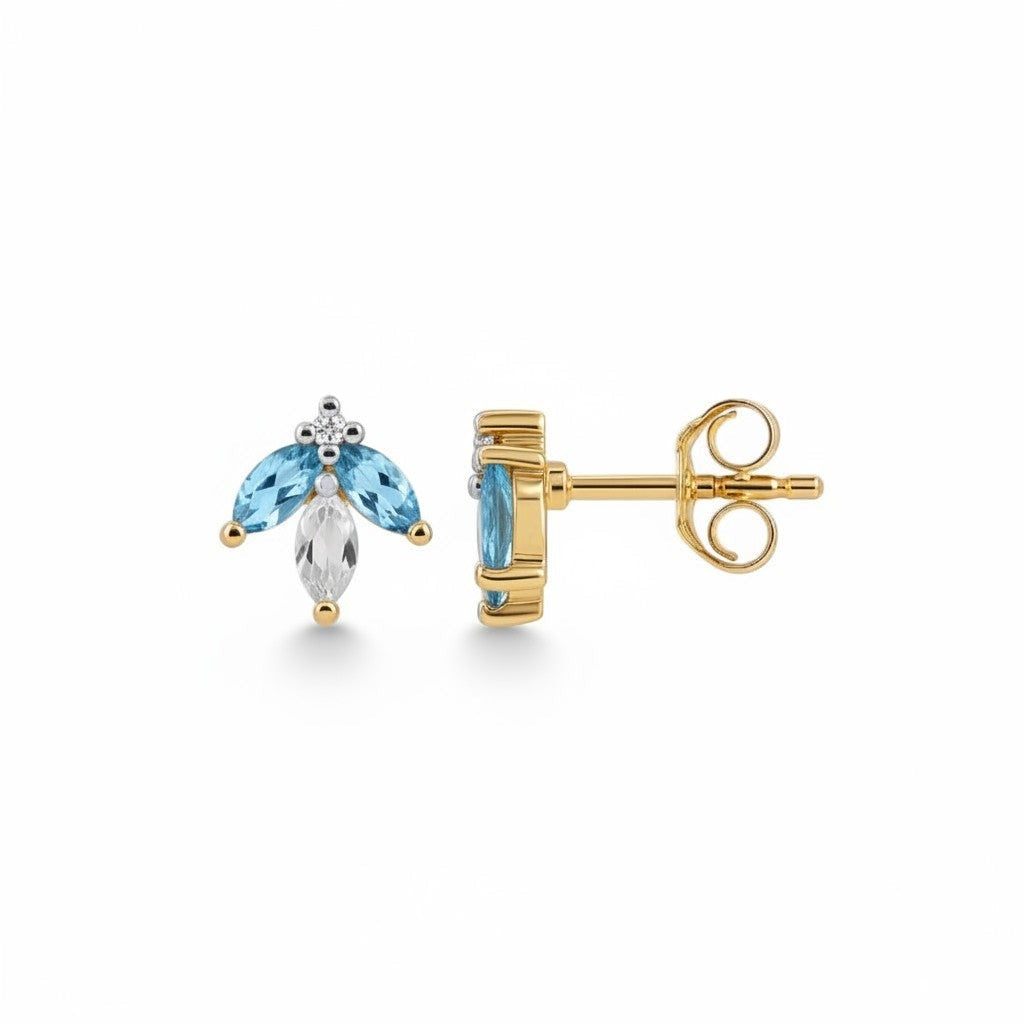 Sophia Schneider Joyas 14K gold earrings with marquise-cut blue topaz, clear quartz, and diamond accents.