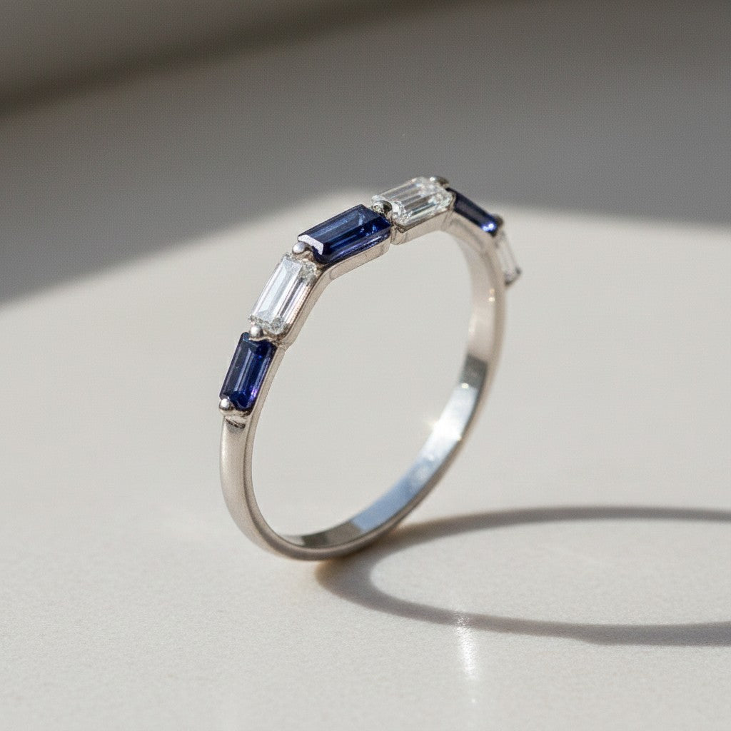 Sophia Schneider Joyas 14K white gold ring with alternating baguette-cut iolite and zircon stones.