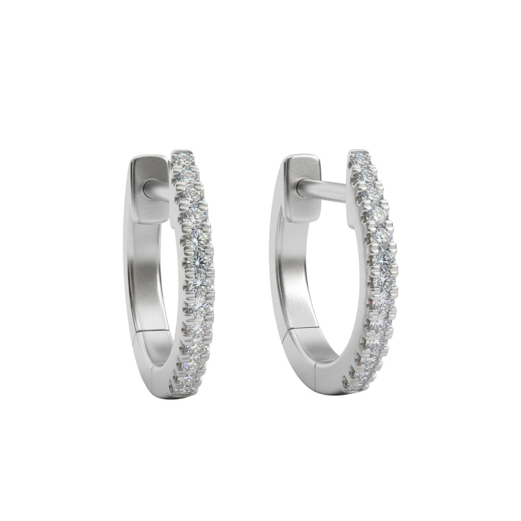 Sophia Schneider Joyas 14K white gold hoop earrings with brilliant-cut diamonds, 1 cm size, 0.10 ct total diamond weight.
