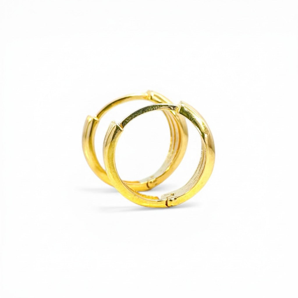Sophia Schneider Joyas 18K gold organic hoop earrings, 15mm diameter, with a smooth, voluminous design for a sophisticated look.