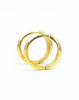 Sophia Schneider Joyas 18K gold organic hoop earrings, 15mm diameter, with a smooth, voluminous design for a sophisticated look.