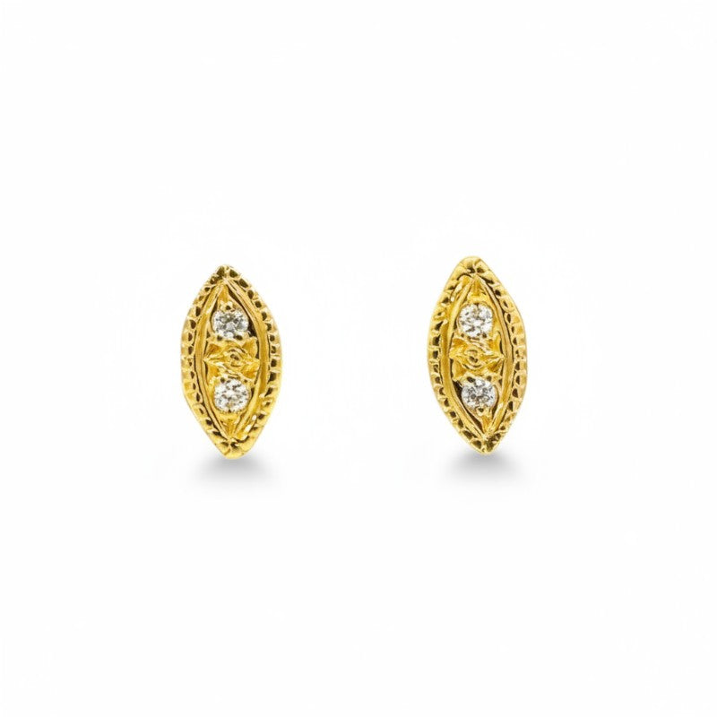 Sophia Schneider Joyas 18K gold oval mini earrings with two brilliant-cut diamonds, 7x3mm.