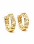 Sophia Schneider Joyas 18K gold oval hoop earrings with textured pyramid details and brilliant-cut diamonds.