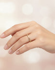 Sophia Schneider Joyas 18K yellow gold band ring with small round rubies set in a scalloped bezel setting.