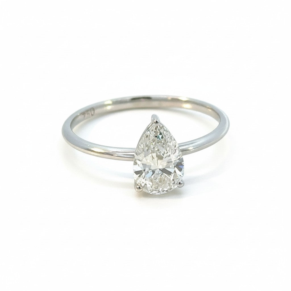 Sophia Schneider Joyas 18K white gold ring with 1 ct pear-cut lab diamond, E-VVS2 quality, IGI certified.