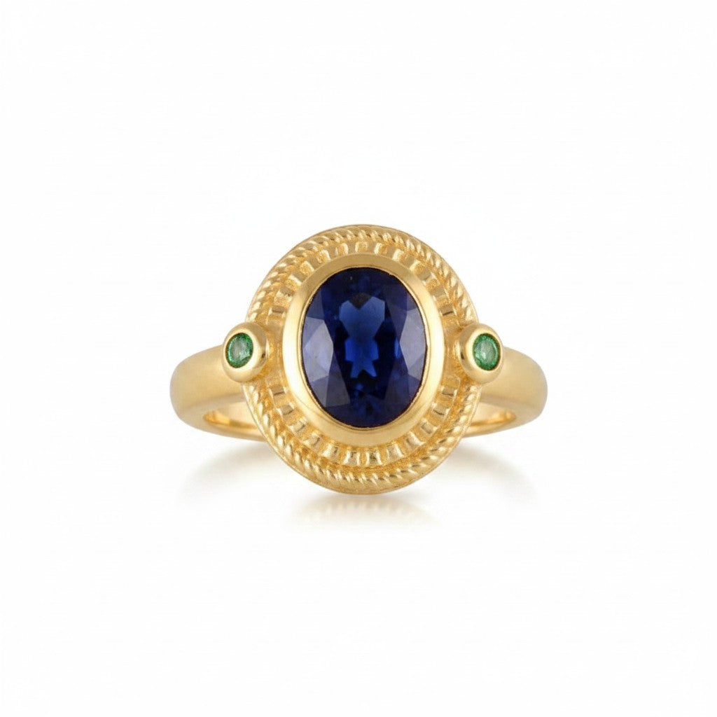 Sophia Schneider Joyas oval blue kyanite ring with green tourmaline accents, set in gold-plated silver.