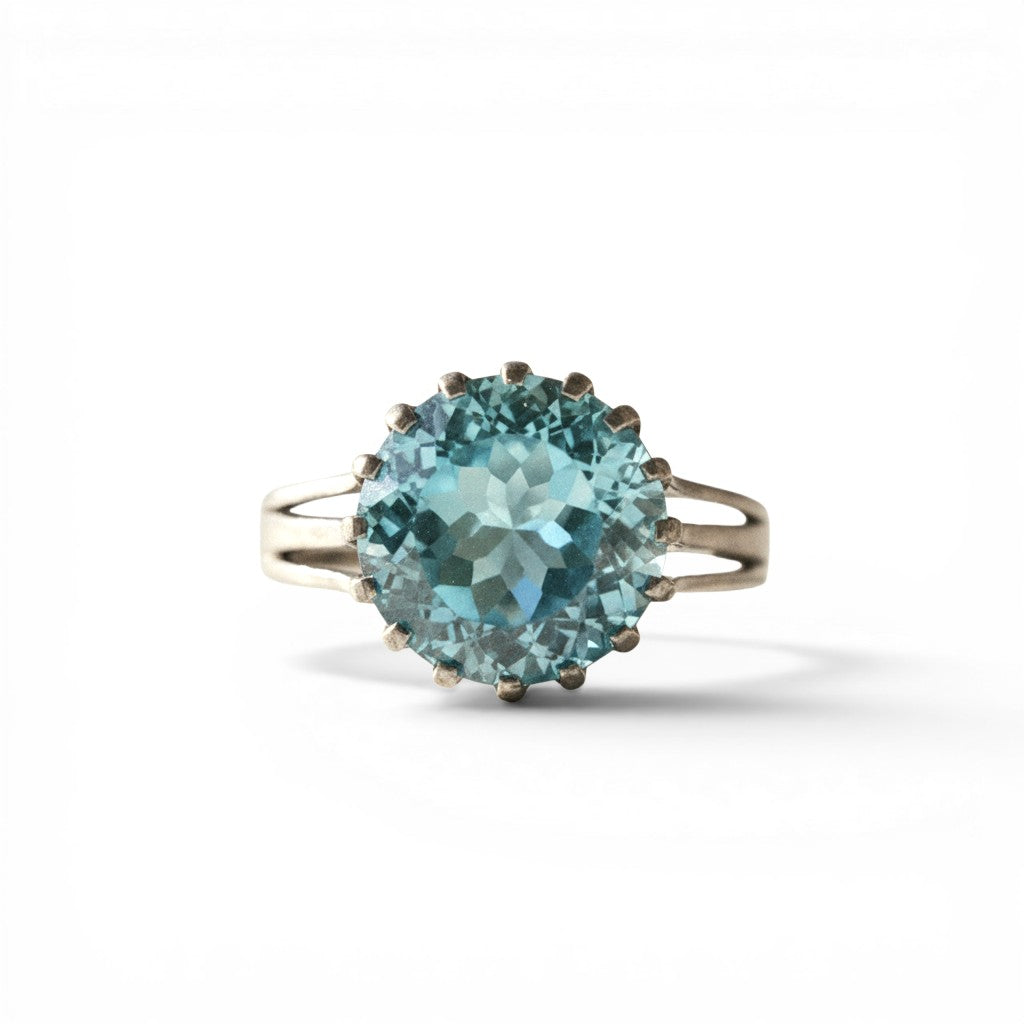 Sophia Schneider Joyas blue topaz crown ring with a 13mm faceted stone set in rhodium-plated silver.