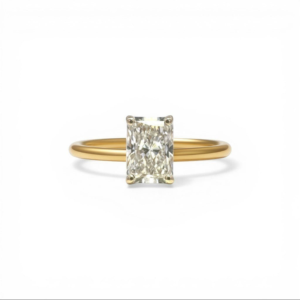 Sophia Schneider Joyas 18K gold ring with a 1.06 ct lab-created emerald-cut diamond, E-VVS2 clarity.