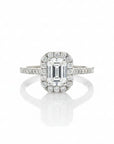 Sophia Schneider Joyas 18K white gold ring with 1.09 ct emerald-cut lab diamond halo and pavé band.