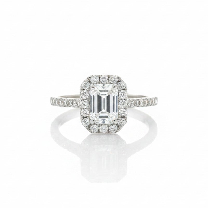 Sophia Schneider Joyas 18K white gold ring with 1.09 ct emerald-cut lab diamond halo and pavé band.