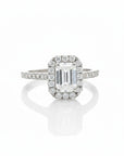 Sophia Schneider Joyas 18K white gold ring with 1.09 ct emerald-cut lab diamond and halo of brilliant-cut diamonds.