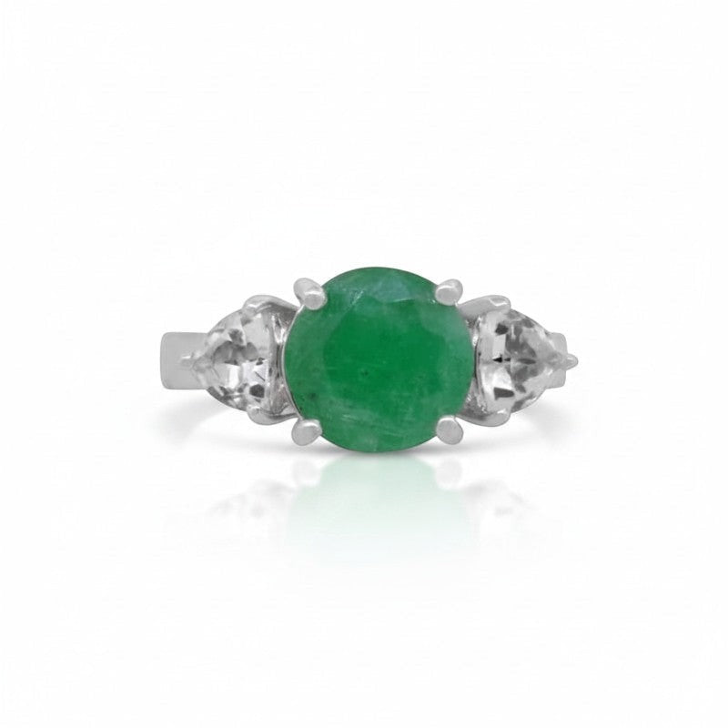 Sophia Schneider Joyas sterling silver ring with a central oval green emerald and two pear-cut white topaz stones.