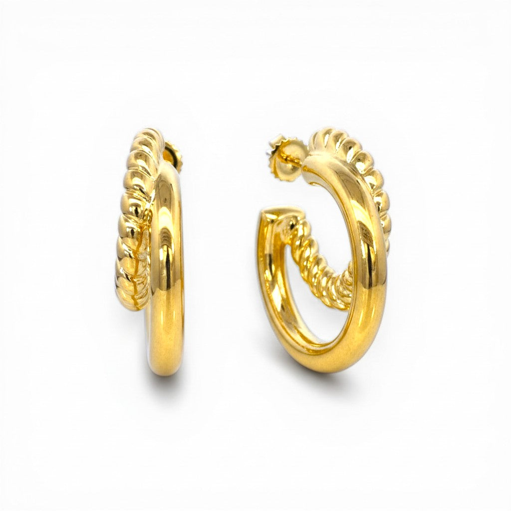 Sophia Schneider Joyas gold-plated double hoop earrings, one twisted, one smooth, 3cm diameter.