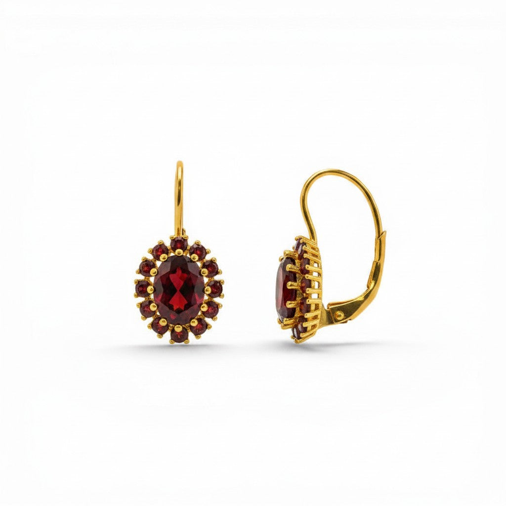 Sophia Schneider Joyas 14K gold oval garnet earrings with halo of small garnets, 2.1 cm length.