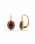 Sophia Schneider Joyas 14K gold oval garnet earrings with halo of small garnets, 2.1 cm length.