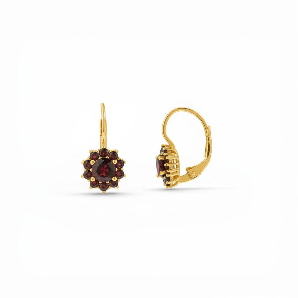 Sophia Schneider Joyas 14K gold dangle earrings featuring a central round garnet surrounded by ten smaller garnets in a floral halo design.
