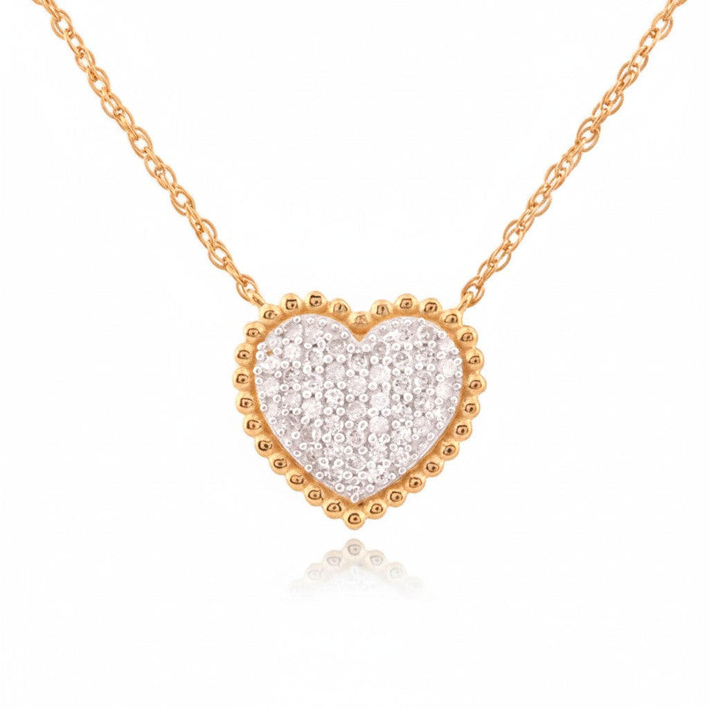 Sophia Schneider Joyas heart pendant necklace with 0.20 ctw diamonds in sterling silver 925 and gold tone beaded edge.