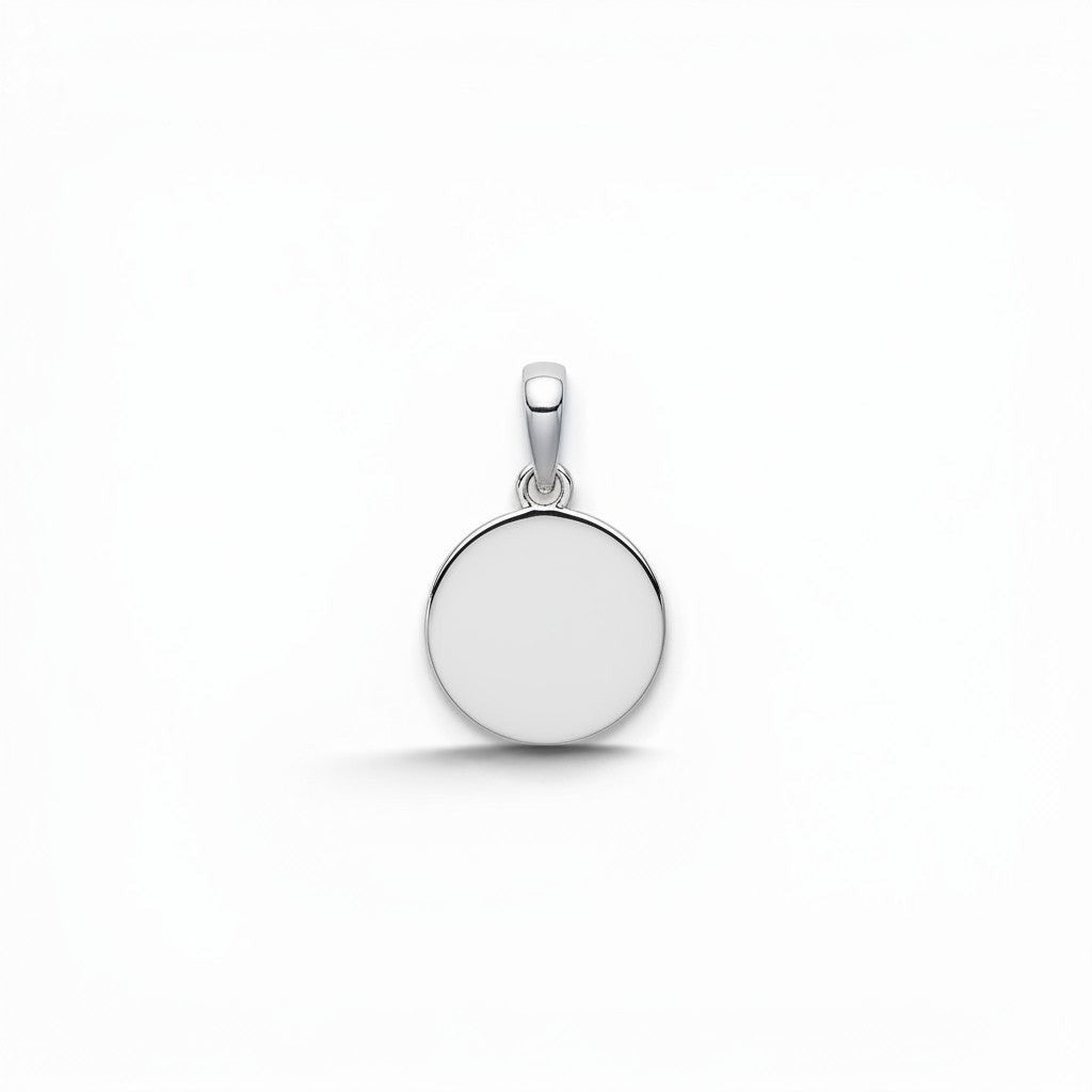 Sophia Schneider Joyas round 12mm Holy Spirit pendant in sterling silver with dove engraving.