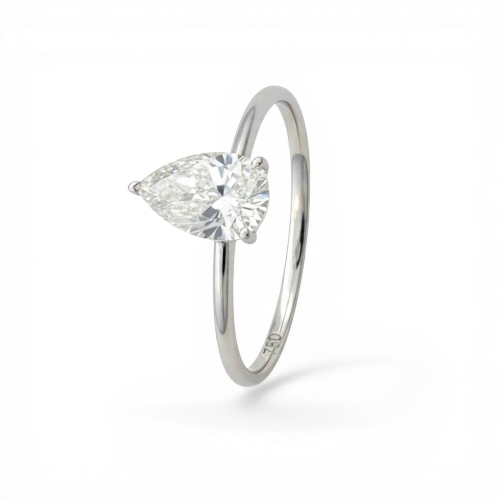 Sophia Schneider Joyas 18K white gold solitaire ring with 1 ct pear-cut lab diamond.