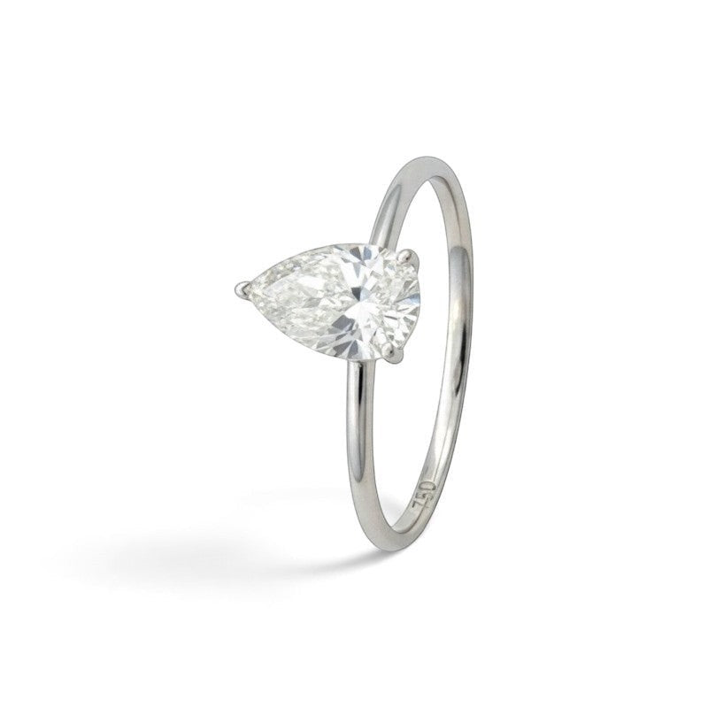 Sophia Schneider Joyas 18K white gold solitaire ring with 1 ct pear-cut lab diamond.