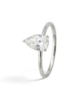 Sophia Schneider Joyas 18K white gold solitaire ring with 1 ct pear-cut lab diamond.