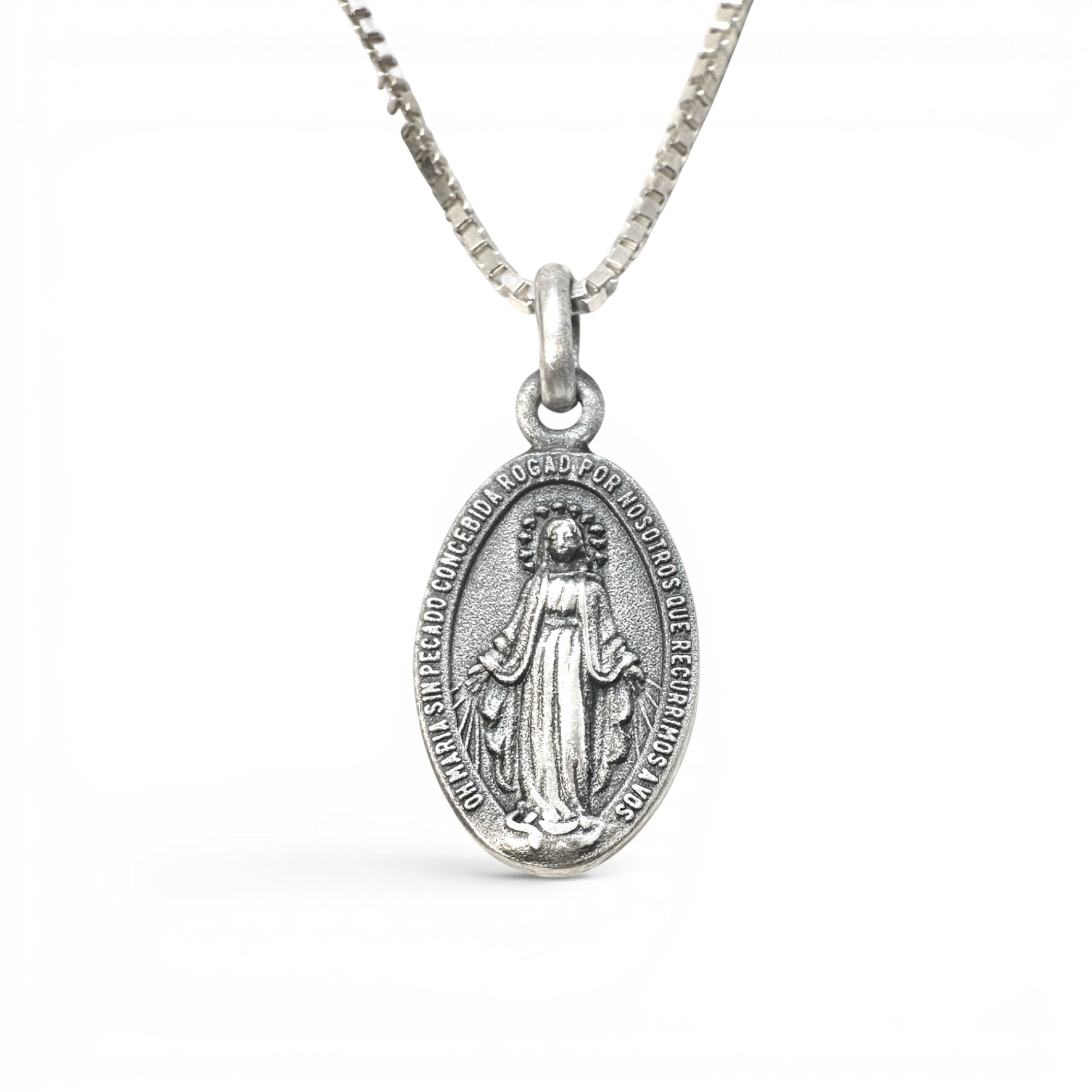 Sophia Schneider Joyas oval 16mm sterling silver medal of the Virgin of the Rays and Sacred Heart, with inscription.