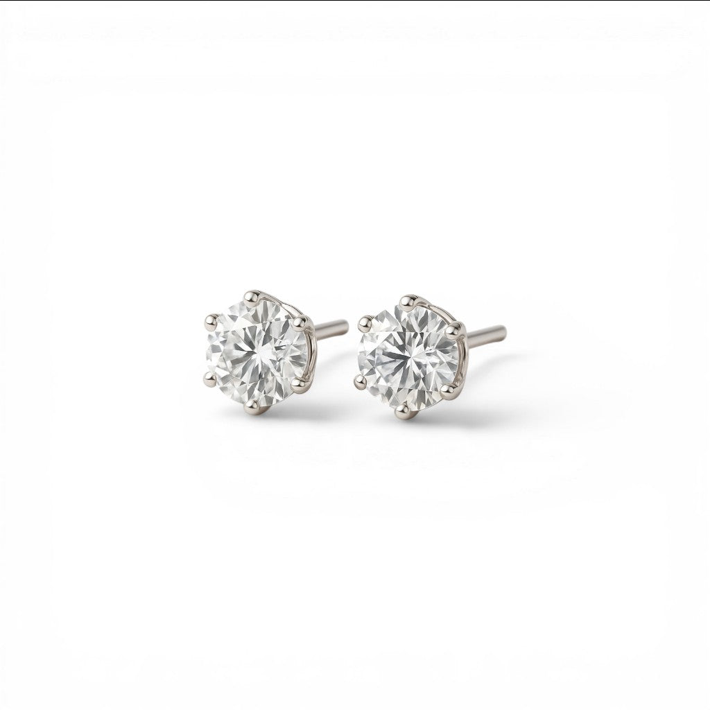 Sophia Schneider Joyas platinum stud earrings with 0.90 ct white sapphire, brilliant cut, prong set. 6mm.