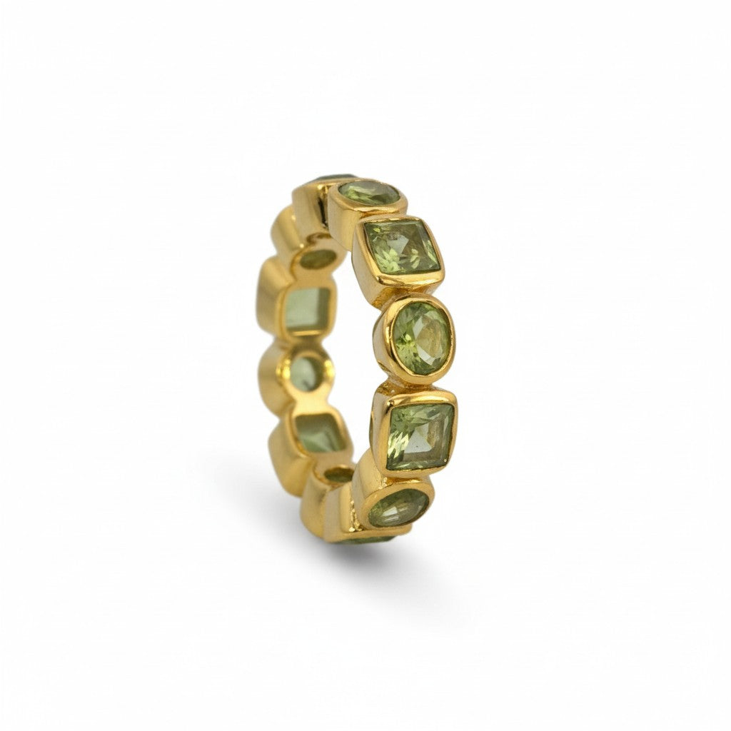 Sophia Schneider Joyas gold-plated silver ring with bezel-set green prehnite stones in square and oval cuts.