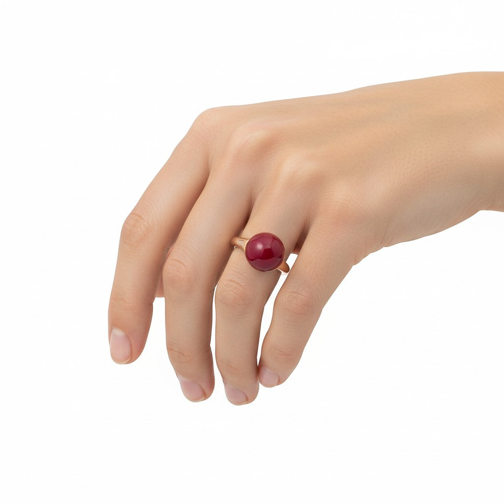 Sophia Schneider Joyas rose gold plated silver ring with a red garnet stone.