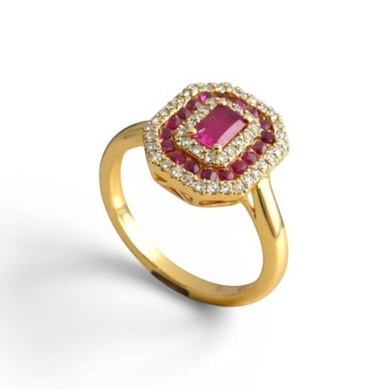 Sophia Schneider Joyas 18k yellow gold ring with octagonal ruby center, surrounded by a halo of round rubies and brilliant-cut diamonds.