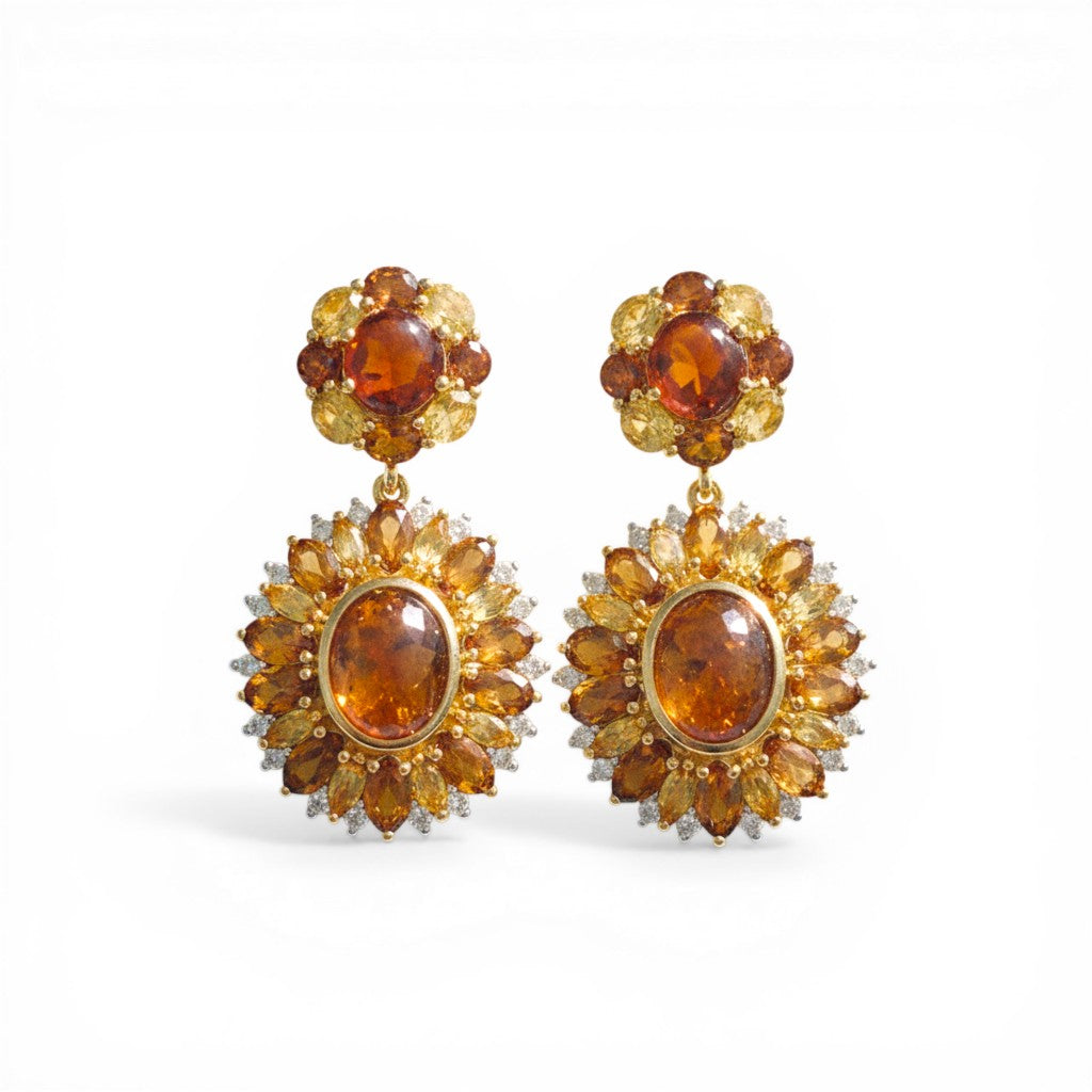 Sophia Schneider Joyas sterling silver earrings with amber, citrine, and cubic zirconia. Oval amber center surrounded by citrine and clear cubic zirconia.