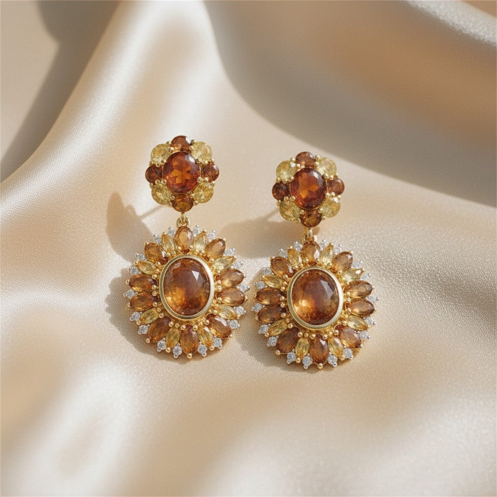 Sophia Schneider Joyas statement earrings with amber, citrine, and zircon stones in silver.