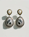 Sophia Schneider Joyas teardrop earrings with white and black stone, silver, gold, and black accents.