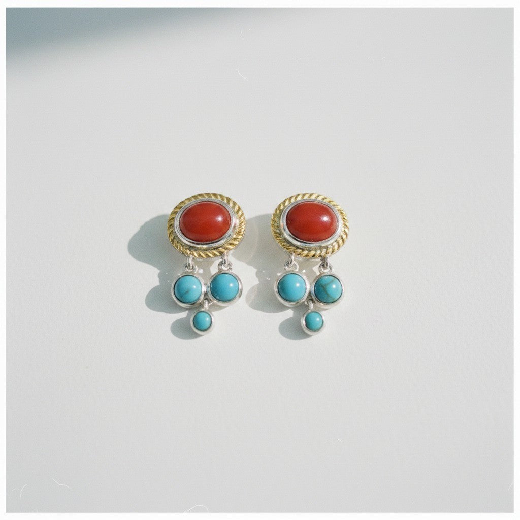 Sophia Schneider Joyas silver earrings with oval red chalcedony and dangling turquoise stones.