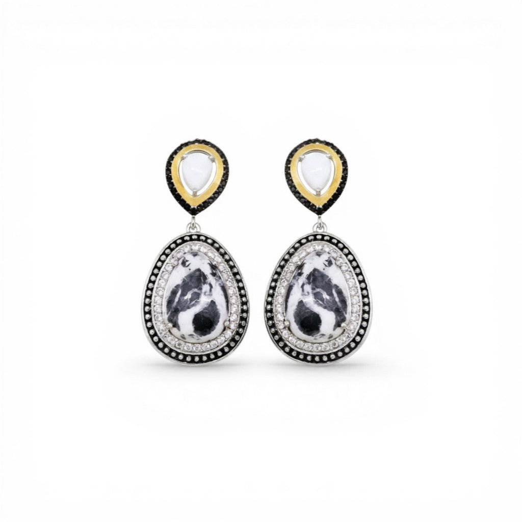 Sophia Schneider Joyas silver earrings with white and black marbled stone, surrounded by clear and black crystals.
