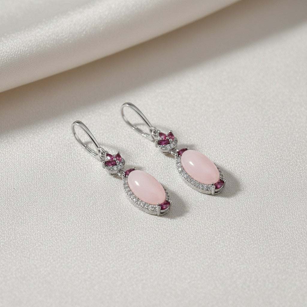 Sophia Schneider Joyas sterling silver drop earrings with pink opals, rhodolites, and cubic zirconia.