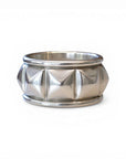 Sophia Schneider Joyas silver ring with pyramid stud design, rhodium plated, size 15.