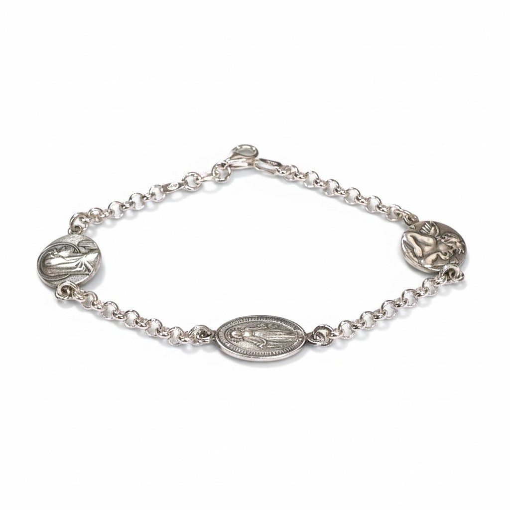 Sophia Schneider Joyas silver 925 bracelet with three religious medals: Virgen de los Rayos, praying Virgin, and Guardian Angel.