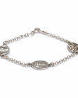Sophia Schneider Joyas silver 925 bracelet with three religious medals: Virgen de los Rayos, praying Virgin, and Guardian Angel.