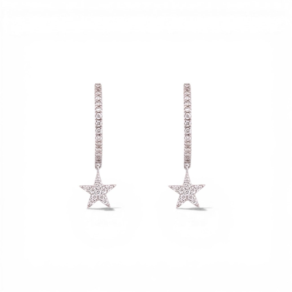 Sophia Schneider Joyas sterling silver hoop earrings with dangling star charms, encrusted with lab-created diamonds.