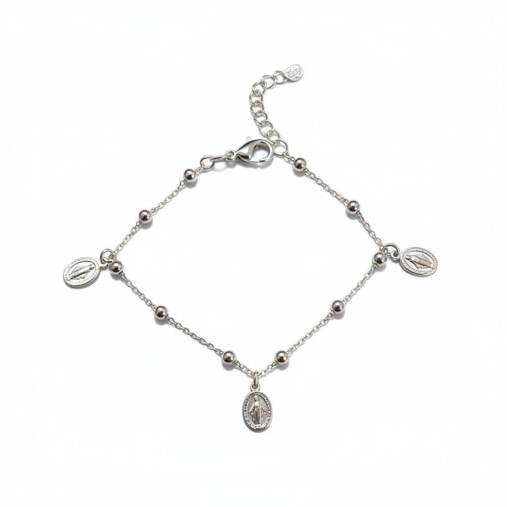 Sophia Schneider Joyas silver chain bracelet with three Virgin Mary medals and beaded accents.