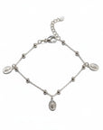 Sophia Schneider Joyas silver chain bracelet with three Virgin Mary medals and beaded accents.