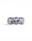 Sophia Schneider Joyas sterling silver ring with three oval blue tanzanite and topaz stones.